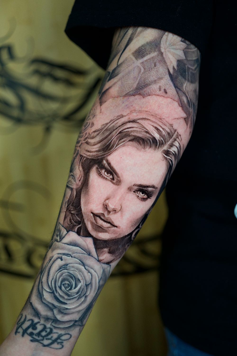 black and gray realism woman portrait forearm tattoo by Antwan Rodriguez, West Palm Beach FL